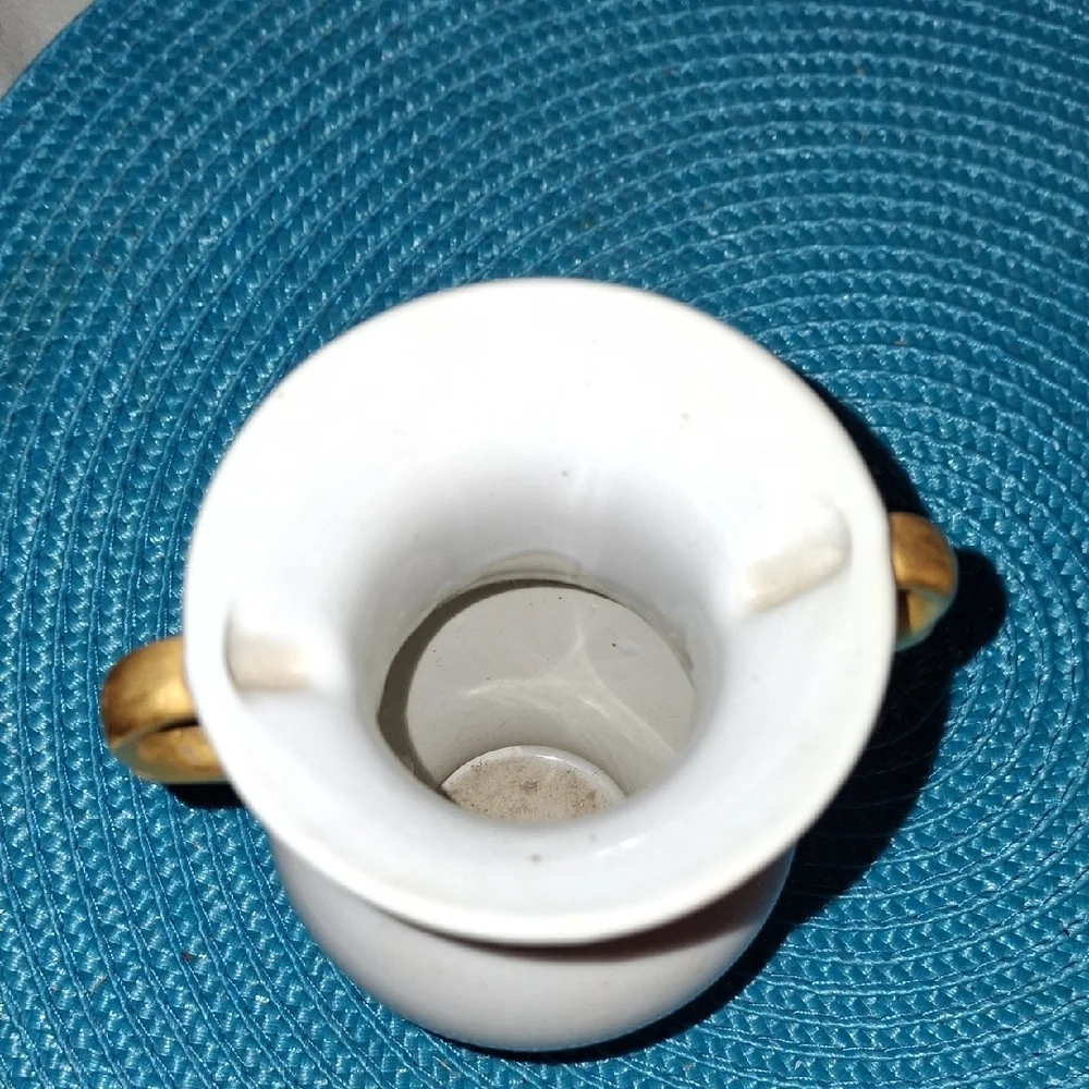 Elegant White Vase with Gold Accents